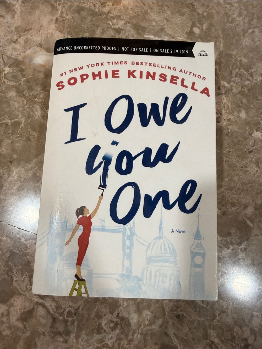 'I Owe You One' - by Sophie Kinsella Paperback White & Blue Cover